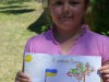 «Я намалювала прапор та калину, Україна – це країна, де я народилася, це моя рідна земля, і саме за це я її люблю», – каже Оля