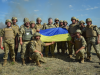 Військові подарували Порошенку бойовий український прапор
