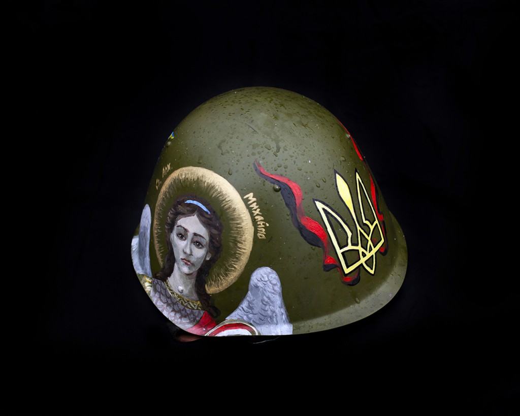 A helmet painted with an image of St. Michael.